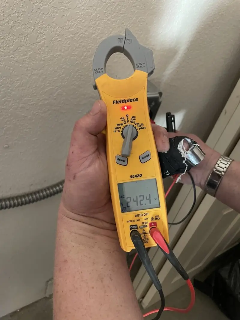 Voltage testing with clamp meter during Aluminum Wiring Replacement in Hurlburt Field